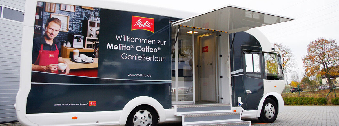 [Translate to English:] Melitta Infomobil Branding Folierung